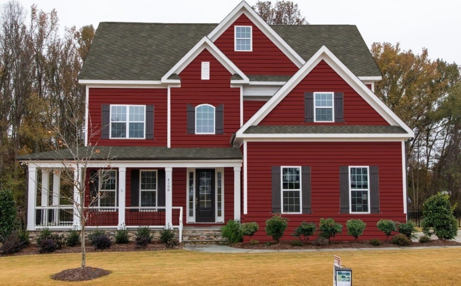 House with autumn red siding | Nansemond River Roofing & Siding